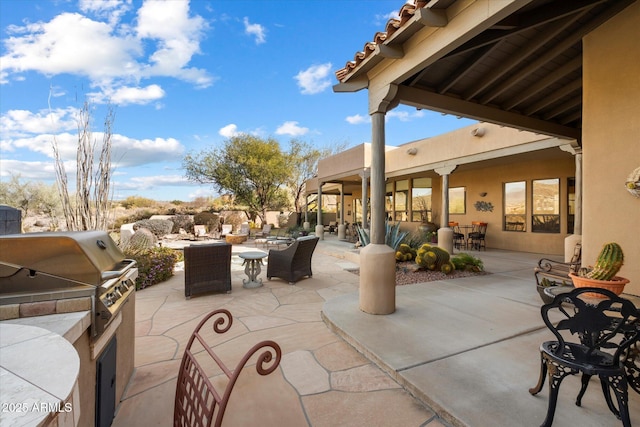 view of patio with area for grilling