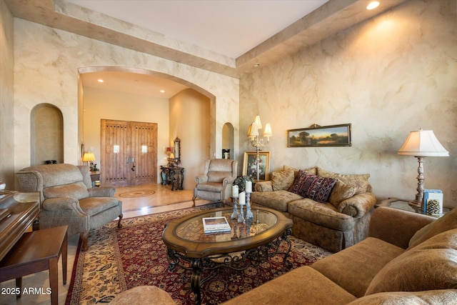 living room with a notable chandelier