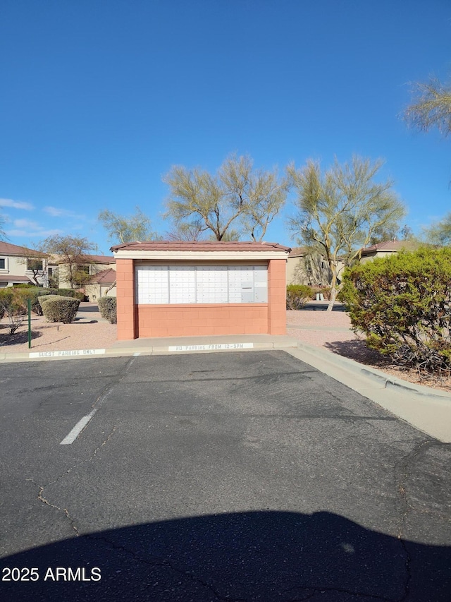 garage with uncovered parking