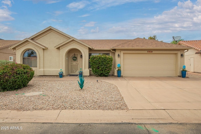 6160 S Pebble Beach Dr, Chandler, AZ 85249 - view of front of property with stucco siding, an attached garage, and driveway