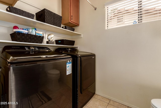 6160 S Pebble Beach Dr, Chandler, AZ 85249 - laundry room with separate washer and dryer, light tile patterned floors, and baseboards