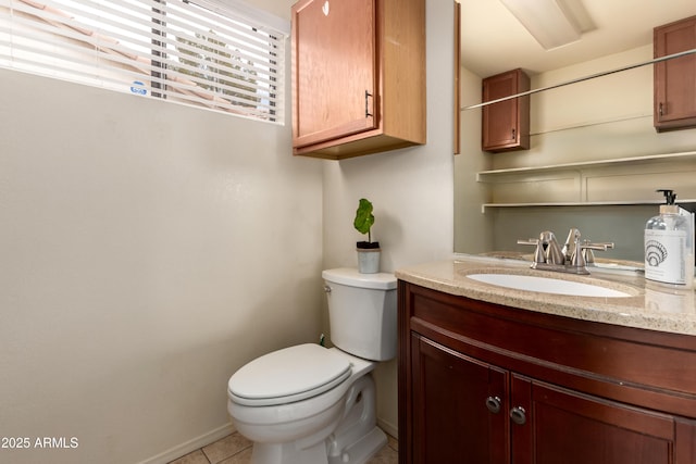 6160 S Pebble Beach Dr, Chandler, AZ 85249 - half bathroom with toilet, vanity, tile patterned flooring, and baseboards