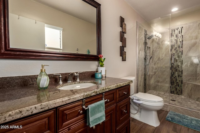 6160 S Pebble Beach Dr, Chandler, AZ 85249 - bathroom with toilet, vanity, a shower stall, and wood finished floors