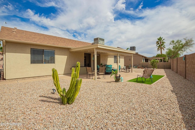 6160 S Pebble Beach Dr, Chandler, AZ 85249 - back of house with a fenced backyard, stucco siding, and a patio