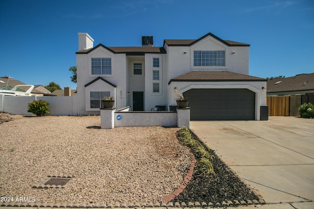 view of front property with a garage