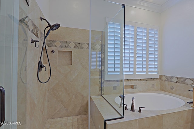full bathroom with a shower stall, ornamental molding, and a bath