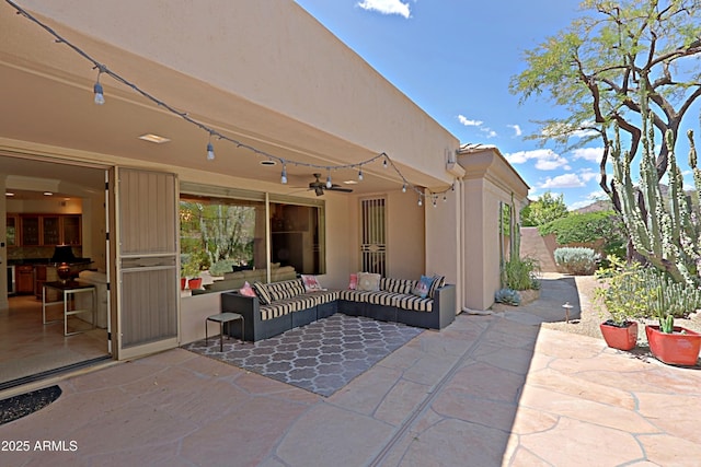 view of patio / terrace featuring a ceiling fan and outdoor lounge area