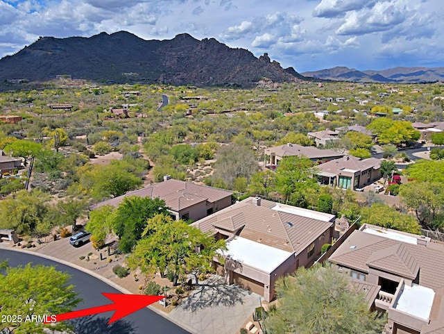 birds eye view of property featuring a residential view and a mountain view