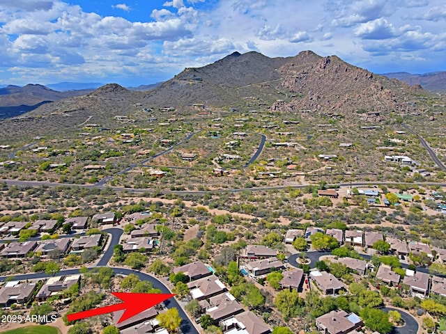 birds eye view of property with a residential view and a mountain view