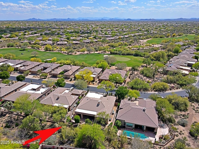 aerial view with a residential view, view of golf course, and a mountain view