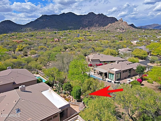 birds eye view of property with a residential view and a mountain view