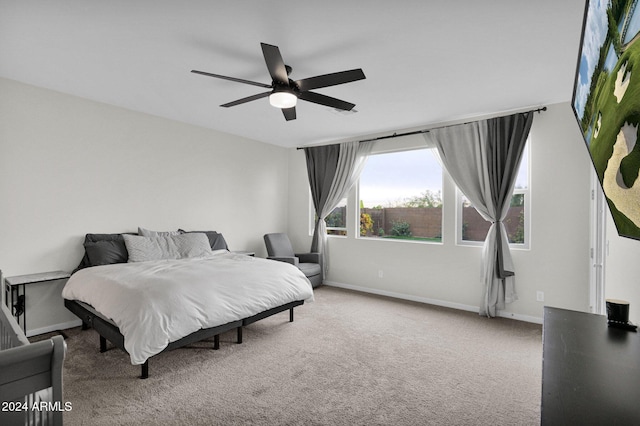 bedroom with carpet flooring and ceiling fan