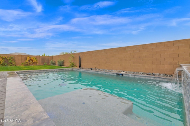 view of pool with pool water feature