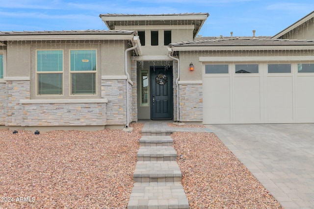 view of front of property with a garage