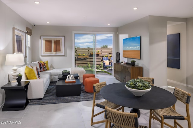 living room with light tile patterned flooring and recessed lighting