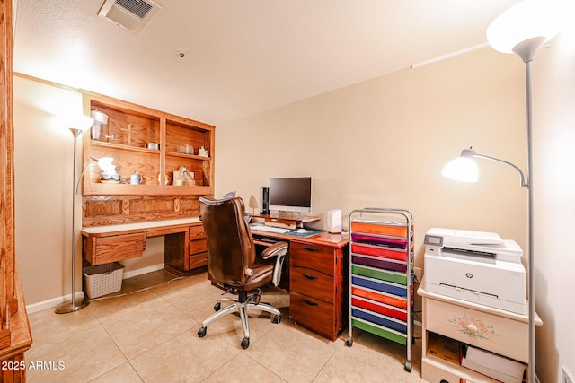 office area featuring light tile patterned floors