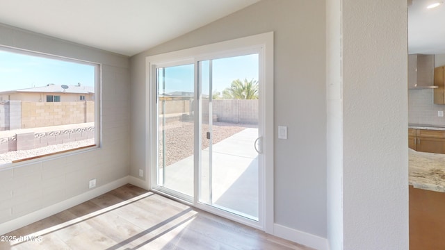 4151 E Clovis Ave, Mesa, AZ 85206 - entryway featuring vaulted ceiling, light wood-type flooring, and baseboards