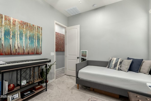 bedroom with visible vents, carpet flooring, and baseboards