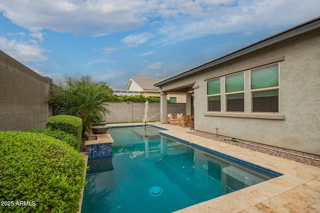 view of swimming pool with a patio, a fenced backyard, and a fenced in pool