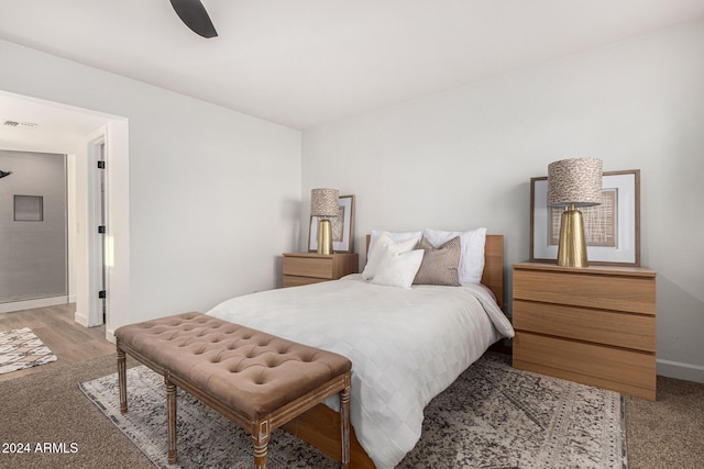 bedroom featuring ceiling fan and light wood-type flooring