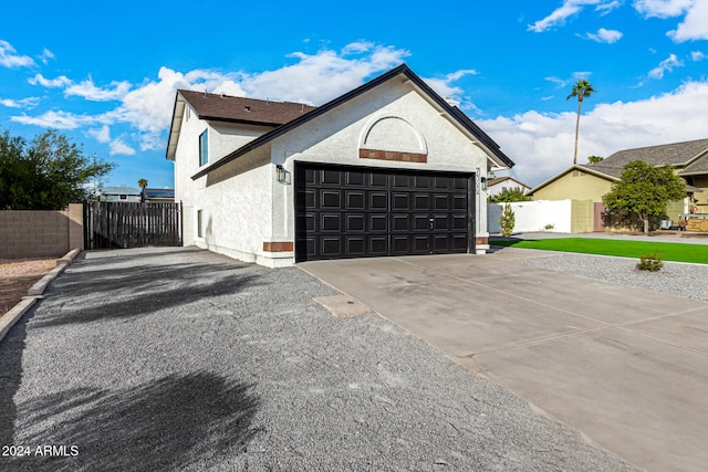 view of home's exterior with a garage