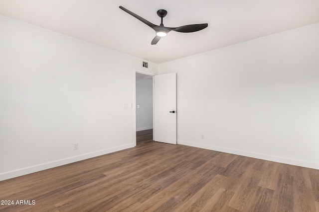 empty room with wood-type flooring and ceiling fan