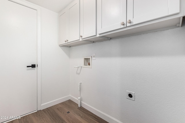 clothes washing area featuring hookup for an electric dryer, washer hookup, cabinets, and dark hardwood / wood-style floors