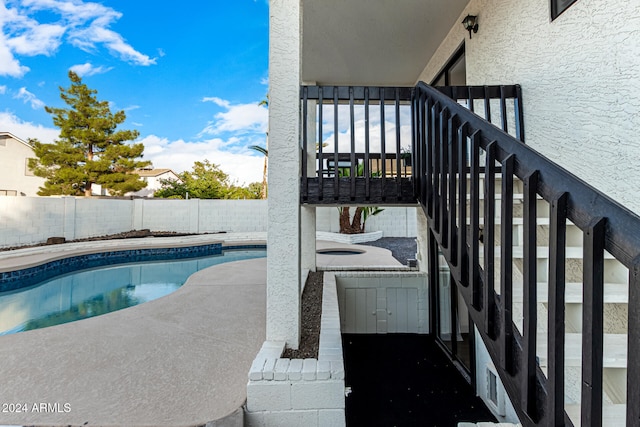 view of swimming pool featuring a patio