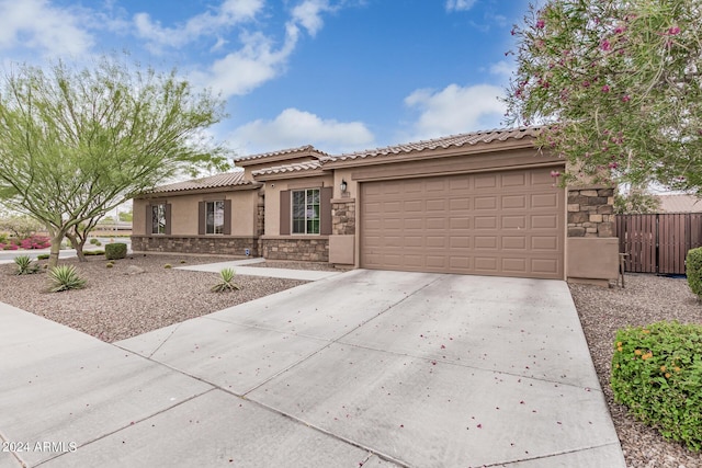 view of front of home with a garage