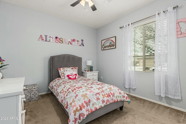 bedroom featuring carpet floors, baseboards, and a ceiling fan