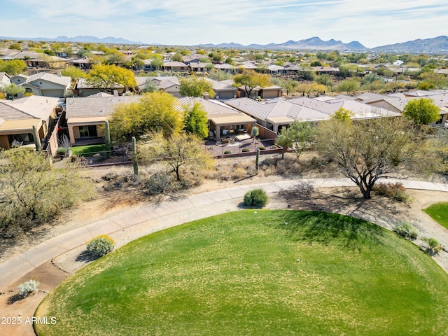 birds eye view of property featuring a mountain view