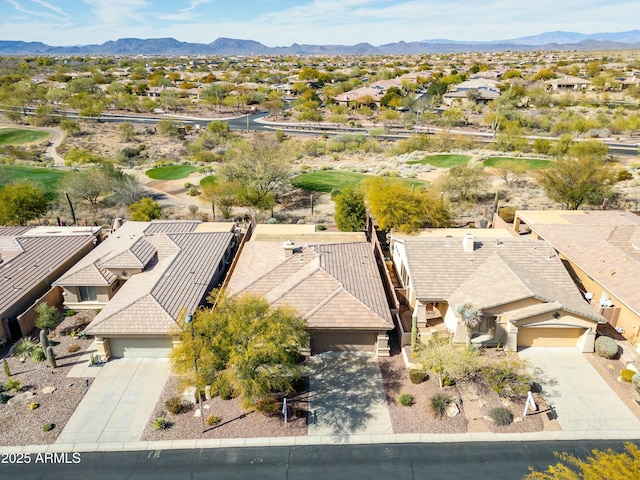 drone / aerial view featuring a mountain view