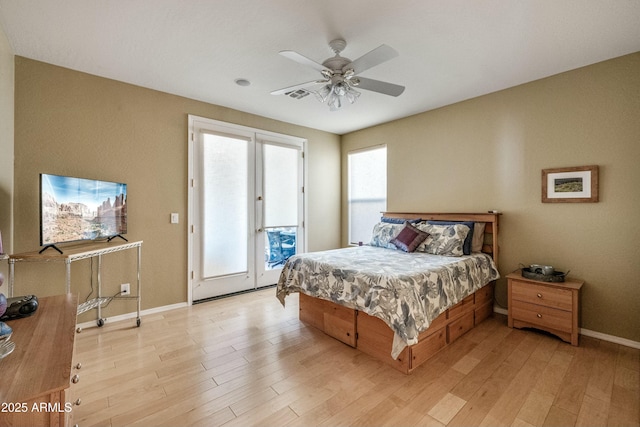 bedroom with ceiling fan, access to exterior, and light hardwood / wood-style flooring