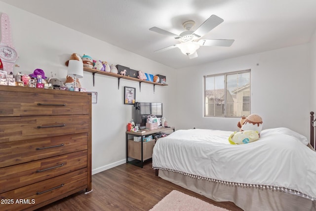 bedroom featuring dark wood-type flooring and ceiling fan