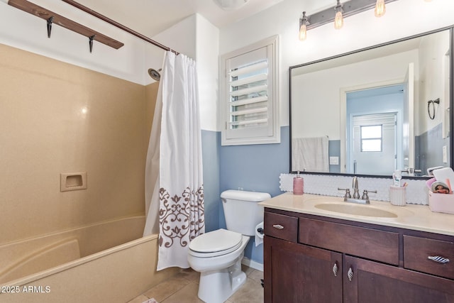 full bathroom with shower / bath combination with curtain, vanity, toilet, and tile patterned flooring