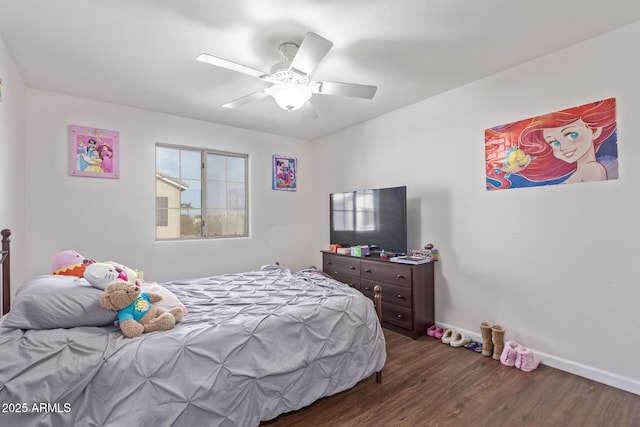 bedroom featuring ceiling fan and dark hardwood / wood-style flooring