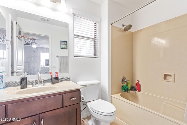 full bathroom with vanity, ceiling fan, shower / washtub combination, and toilet