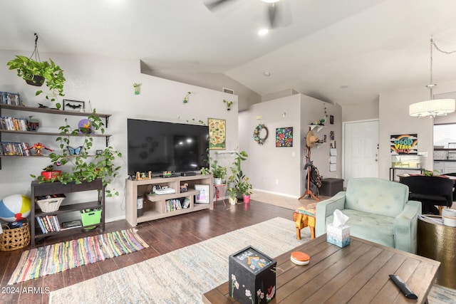 living room with ceiling fan, dark hardwood / wood-style flooring, and vaulted ceiling