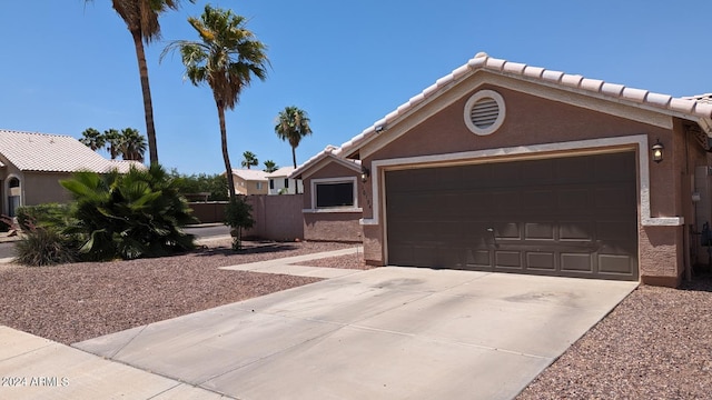 view of front of property featuring a garage