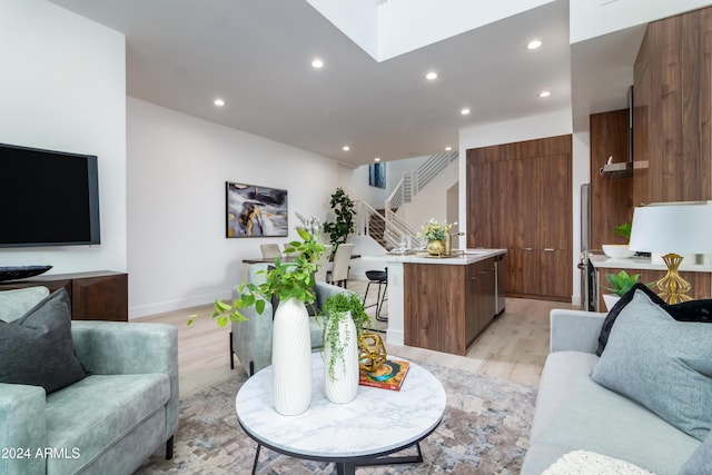 living room with light hardwood / wood-style floors