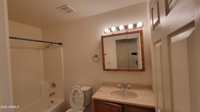 bathroom with toilet, vanity, and shower / bath combination