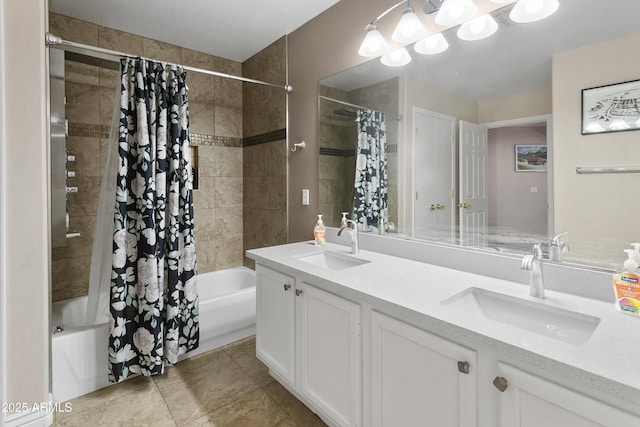 bathroom with a sink, tile patterned floors, shower / bath combo with shower curtain, and double vanity