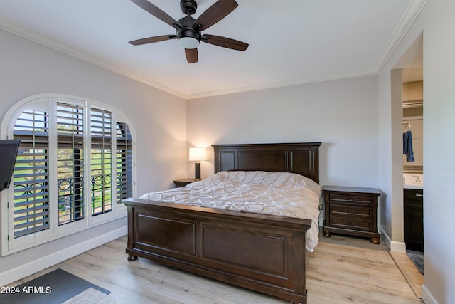 bedroom featuring light wood-type flooring, ceiling fan, and crown molding