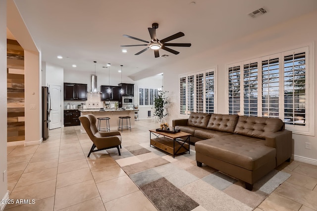 13145 W Whisper Rock Trl, Peoria, AZ 85383 - living area featuring ceiling fan, light tile patterned floors, recessed lighting, and plenty of natural light