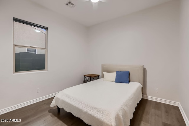 13145 W Whisper Rock Trl, Peoria, AZ 85383 - bedroom with wood finished floors and ceiling fan