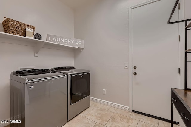 13145 W Whisper Rock Trl, Peoria, AZ 85383 - washroom featuring washer and dryer and baseboards