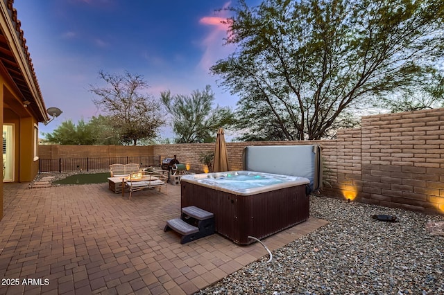 13145 W Whisper Rock Trl, Peoria, AZ 85383 - fenced backyard featuring a hot tub, a patio area, and an outdoor fire pit