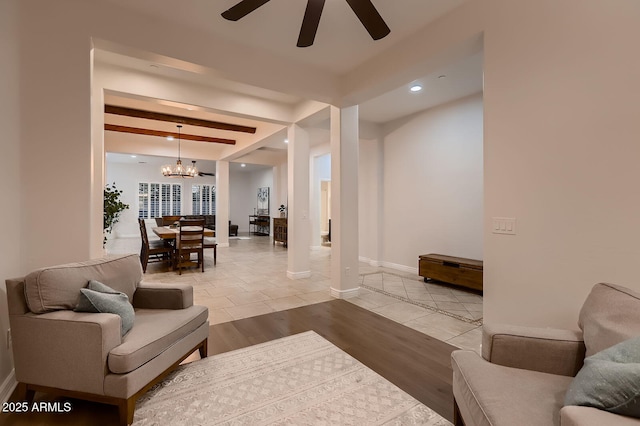 13145 W Whisper Rock Trl, Peoria, AZ 85383 - living room with a ceiling fan, a chandelier, recessed lighting, tile patterned flooring, and beam ceiling