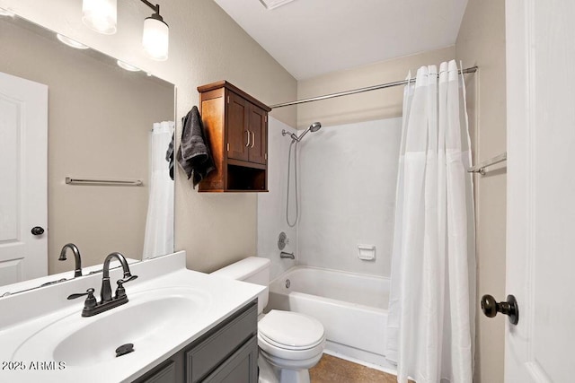 full bathroom with vanity, shower / tub combo with curtain, and toilet
