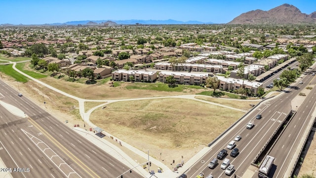 bird's eye view of a main thoroughfare and a mountainous background